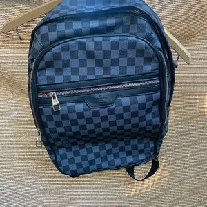 Elegant Checkered Black Backpack